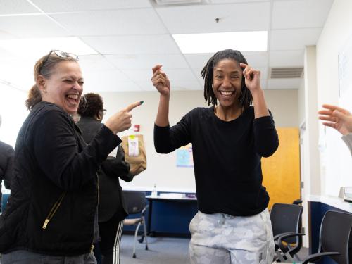 two ladies laughing 